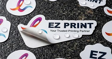 Collection of waterproof vinyl labels, metallic silver foil stickers, and textured kraft product labels.