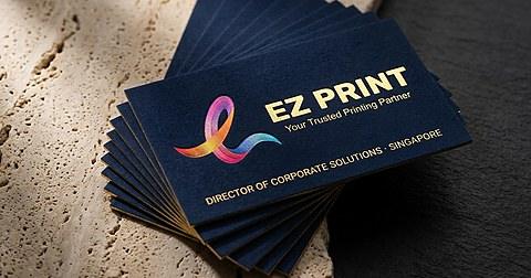 Illustrative close-up of textured white card with recessed lettering.