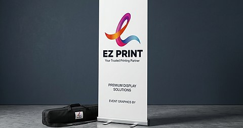 Illustrative pair of roll-up banner stands with printed display panels.