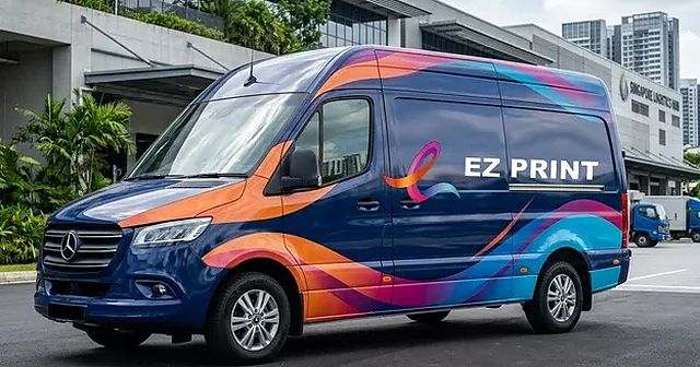 Commercial vehicle with full-colour printed fleet wrap graphics.