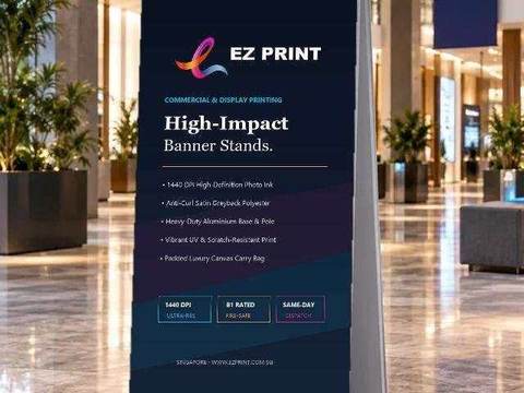 A freestanding pull-up banner with printed colour graphics.